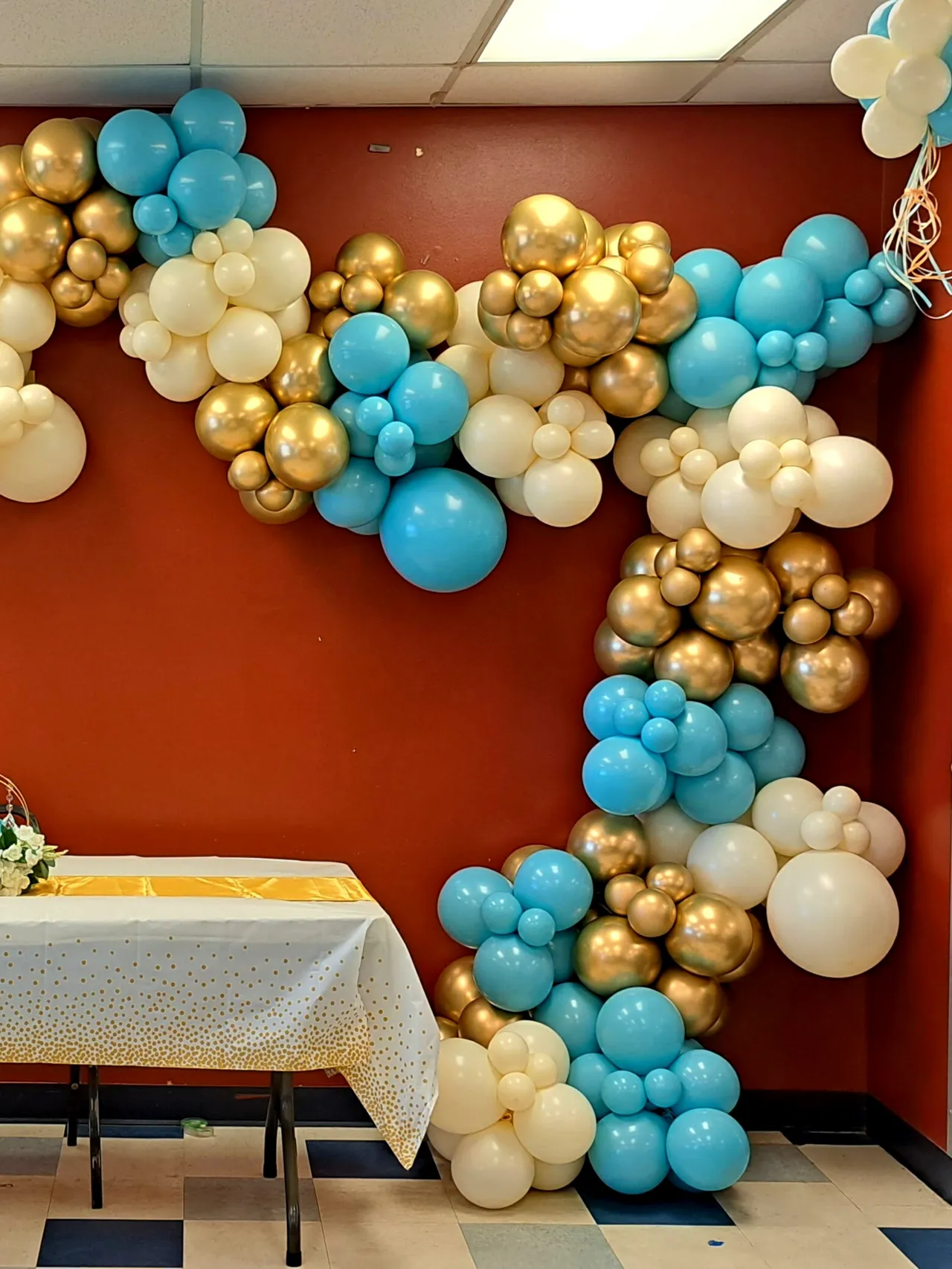 blue, white, and gold organic balloon garland