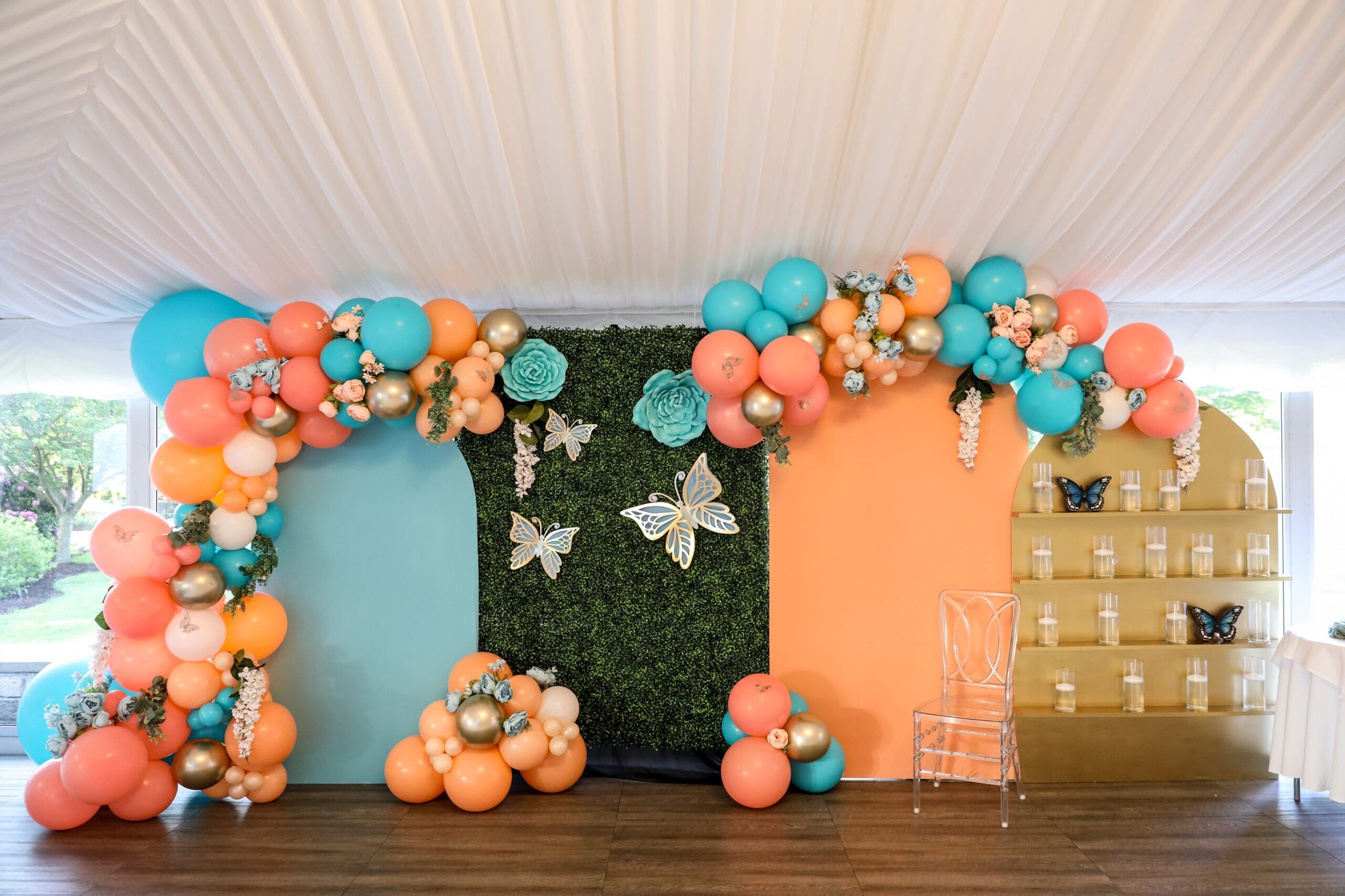 double chiara wall arch backdrop with butterflies