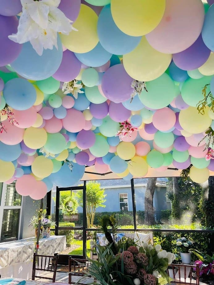 organic spring themed balloon ceiling