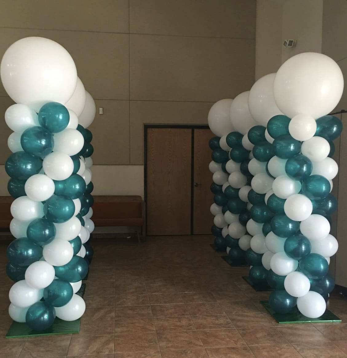 green and white balloon columns