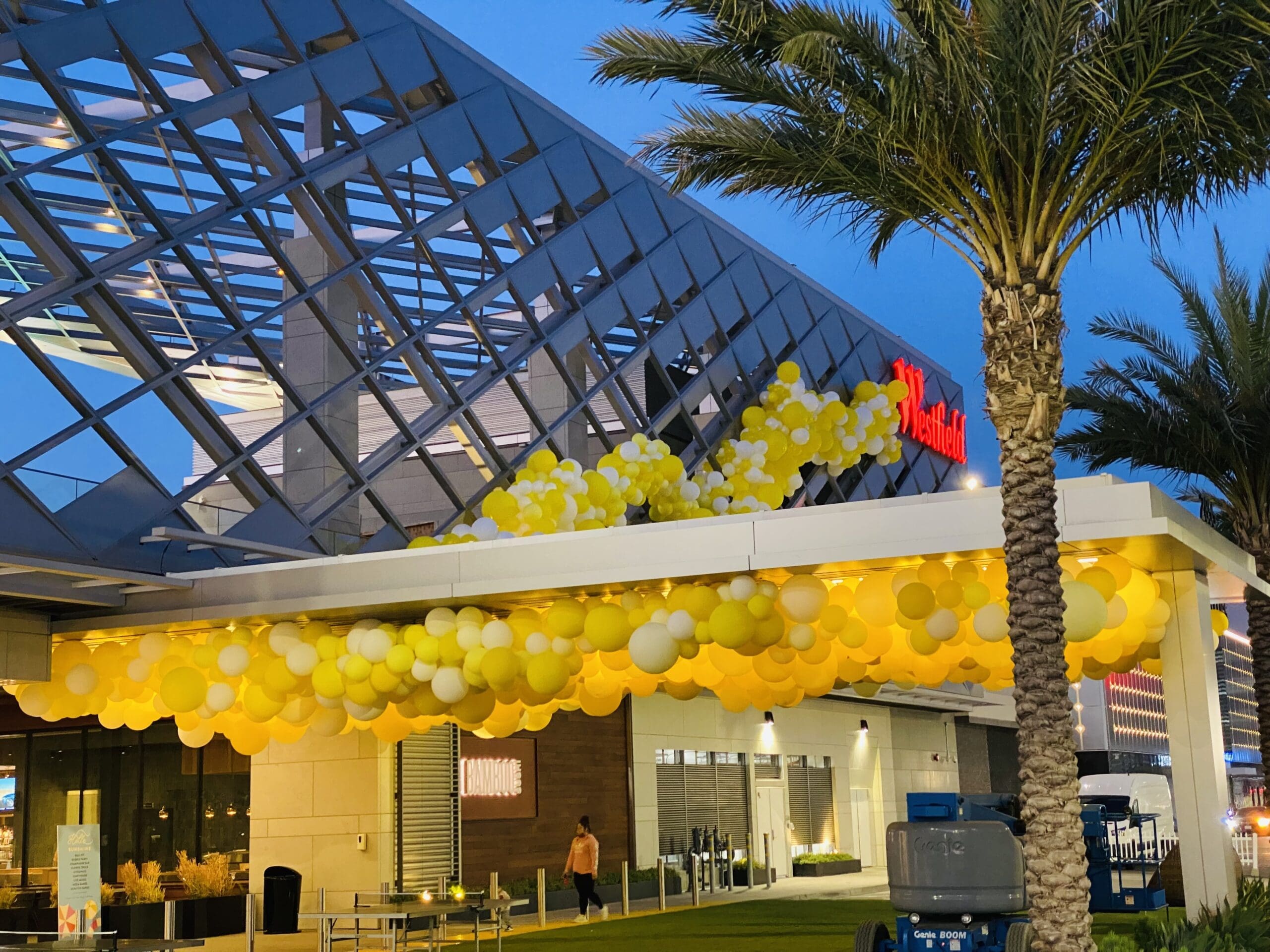 yellow and white balloon ceiling that is outdoors