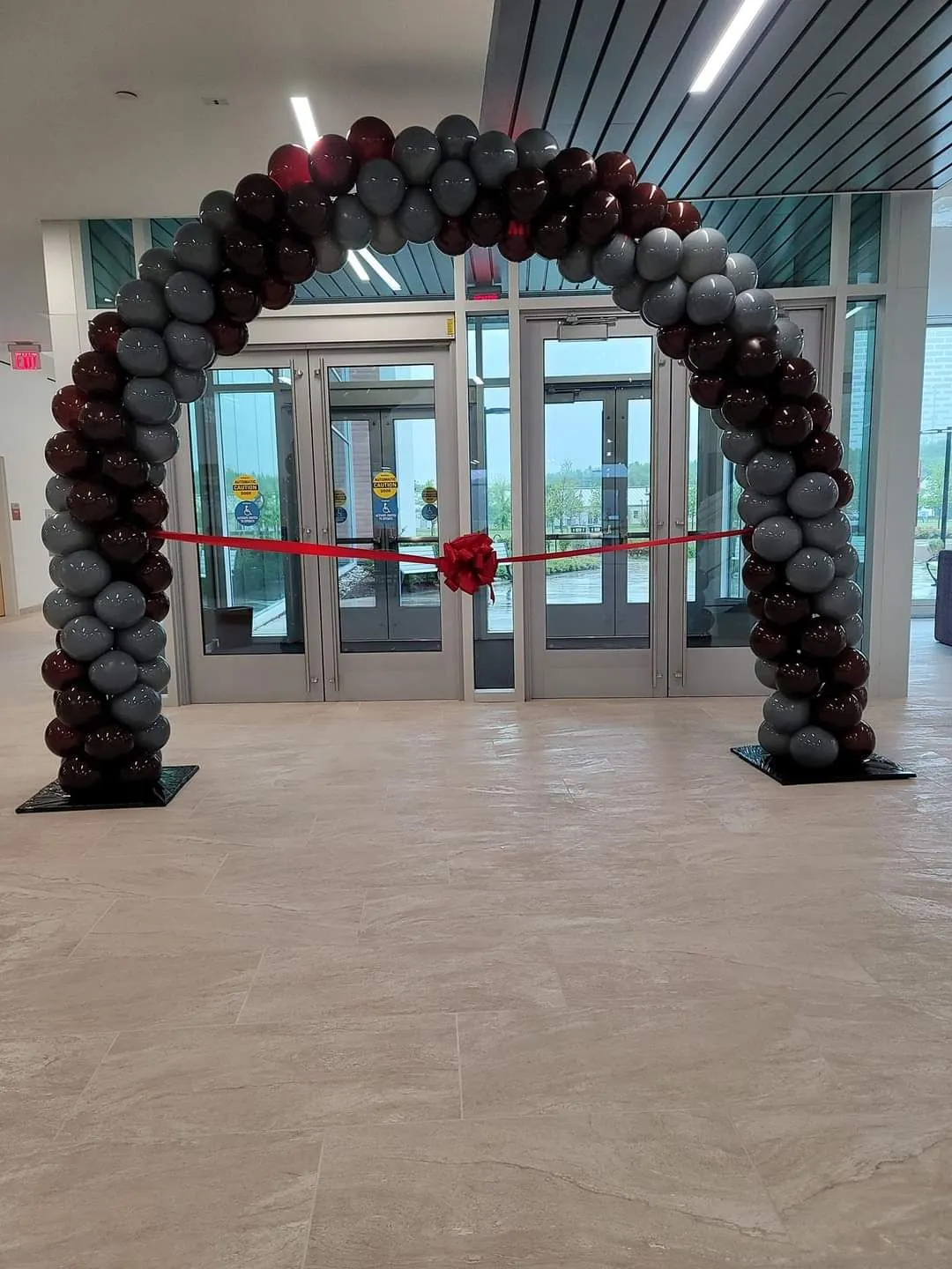 Maroon and Gray Balloon Arch at the University of Maryland Eastern Shore (UMES) School of Pharmacy Ribbon Cutting