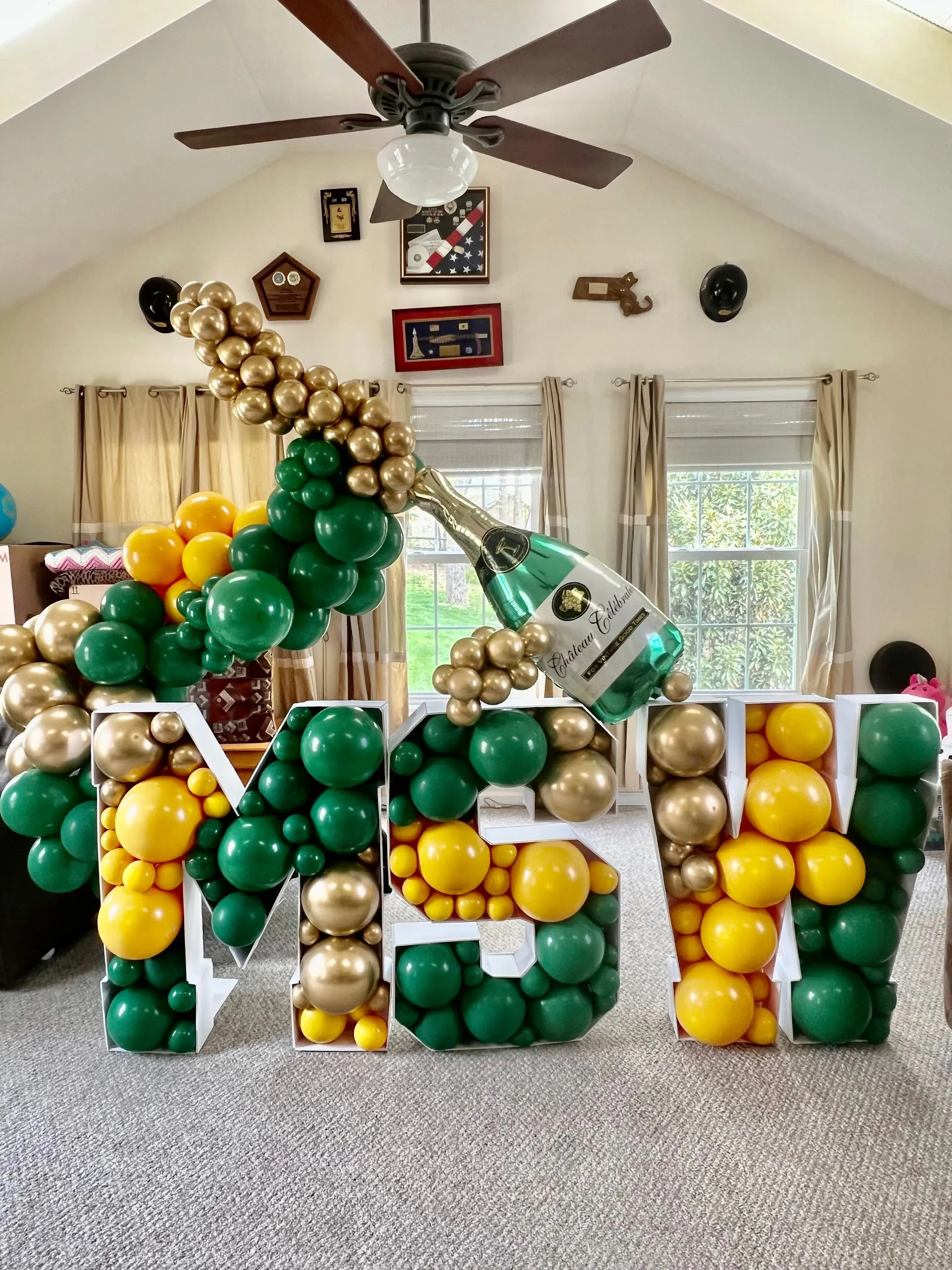 College graduation balloon mosaic with champaign and MSW letters