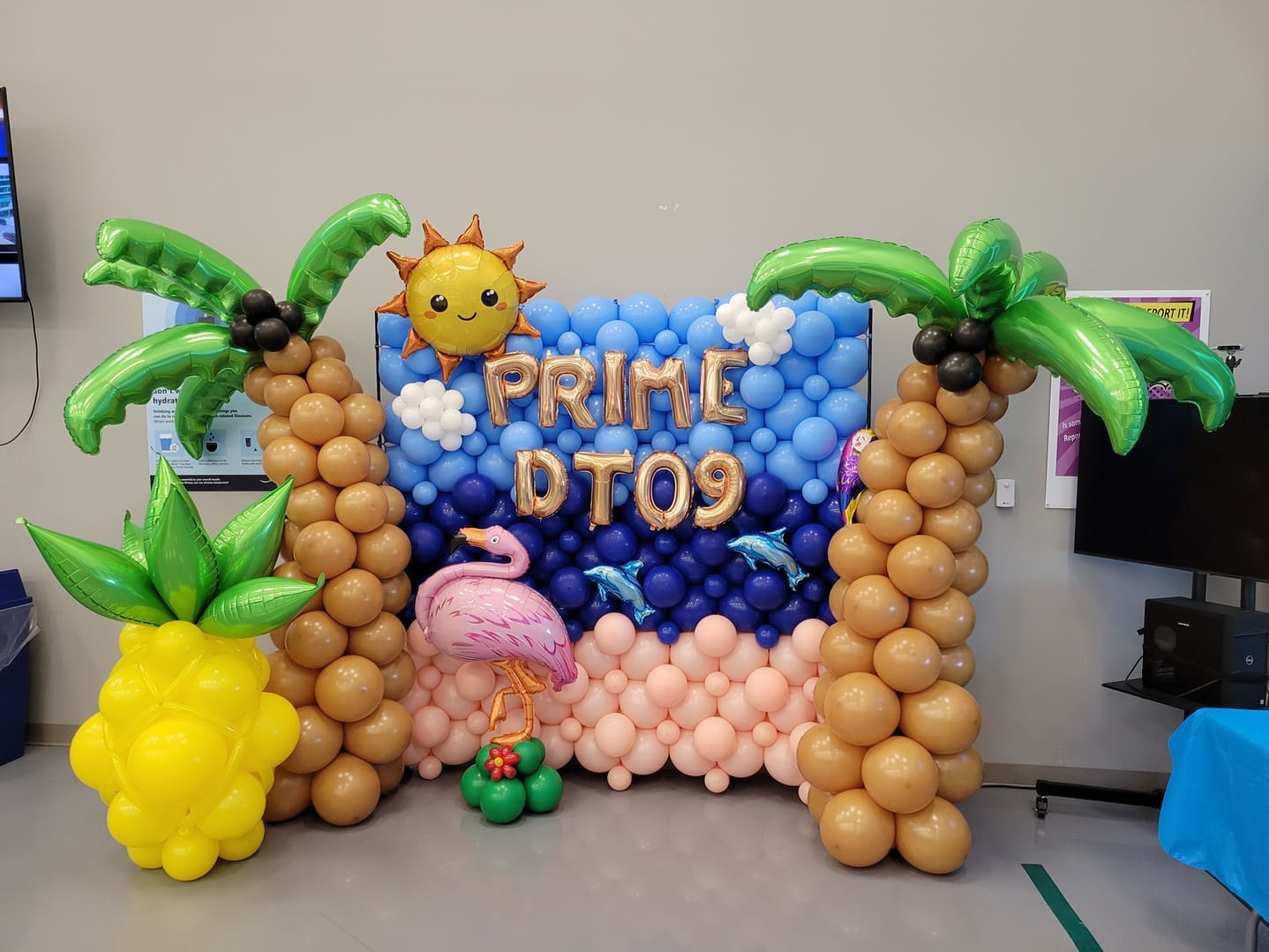 Prime balloon wall with a tropical theme.